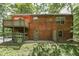 Wooden house with a deck and backyard at 8157 Center Lake Rd, Nineveh, IN 46164