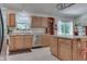 Updated kitchen with an island and wood cabinets at 8157 Center Lake Rd, Nineveh, IN 46164