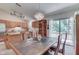 Bright dining room with hardwood floors and sliding glass doors at 8157 Center Lake Rd, Nineveh, IN 46164
