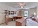 Home office with U-shaped desk and window at 8157 Center Lake Rd, Nineveh, IN 46164