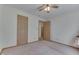 Simple bedroom with light walls and carpeted floor at 8157 Center Lake Rd, Nineveh, IN 46164
