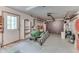 Attached garage with shelving and room for storage at 8157 Center Lake Rd, Nineveh, IN 46164