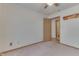 Simple bedroom with carpet and access to bath at 8157 Center Lake Rd, Nineveh, IN 46164