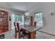 Dining area with hardwood floors and a chandelier at 8157 Center Lake Rd, Nineveh, IN 46164