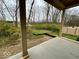 View of backyard from covered patio; partially wooded lot at 11327 Briargate Dr, Fishers, IN 46040