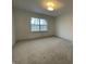 Bright bedroom featuring carpet and a window at 11327 Briargate Dr, Fishers, IN 46040