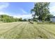 Large backyard with grassy area and playset at 2719 E 28Th St, Indianapolis, IN 46218