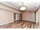 Dining room with laminate floors and access to kitchen at 2719 E 28Th St, Indianapolis, IN 46218