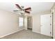 Bedroom with ceiling fan, window, and closet at 2719 E 28Th St, Indianapolis, IN 46218