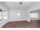 Spacious dining room with hardwood floors and window seats at 906 N Parker Ave, Indianapolis, IN 46201