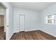 Charming bedroom with hardwood floors and a closet at 906 N Parker Ave, Indianapolis, IN 46201