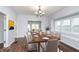 Elegant dining room with hardwood floors and window seat at 906 N Parker Ave, Indianapolis, IN 46201
