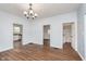Bright dining room with hardwood floors and chandelier at 906 N Parker Ave, Indianapolis, IN 46201