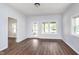 Large living room with hardwood floors and lots of natural light at 906 N Parker Ave, Indianapolis, IN 46201
