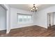 Dining room with hardwood floors and bay window at 906 N Parker Ave, Indianapolis, IN 46201
