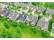 Aerial view of houses and lush green landscaping at 15482 Bridgewater Club Blvd, Carmel, IN 46033
