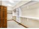 Large walk-in closet featuring built-in shelves and rods at 15482 Bridgewater Club Blvd, Carmel, IN 46033