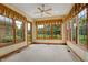 Sunroom with multiple windows and a ceiling fan at 15482 Bridgewater Club Blvd, Carmel, IN 46033