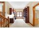 Home office with built-in bookshelves and desk at 15482 Bridgewater Club Blvd, Carmel, IN 46033