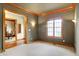 Spacious home office with wood trim and carpet flooring at 15482 Bridgewater Club Blvd, Carmel, IN 46033