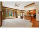 Open concept living room and kitchen with island and hardwood floors at 15482 Bridgewater Club Blvd, Carmel, IN 46033