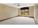 Spacious bedroom with a large window and ceiling fan at 15482 Bridgewater Club Blvd, Carmel, IN 46033
