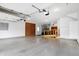 Spacious garage with golf cart and storage at 15482 Bridgewater Club Blvd, Carmel, IN 46033