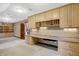 Spacious home office with built-in desk and shelving at 15482 Bridgewater Club Blvd, Carmel, IN 46033