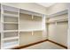 Spacious walk-in closet with ample shelving and hanging space at 15482 Bridgewater Club Blvd, Carmel, IN 46033