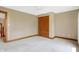 Bright bedroom with double doors and ceiling fan at 15482 Bridgewater Club Blvd, Carmel, IN 46033