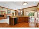 Spacious kitchen with granite countertops and wooden cabinets at 15482 Bridgewater Club Blvd, Carmel, IN 46033