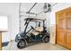 Garage with golf cart and storage at 15482 Bridgewater Club Blvd, Carmel, IN 46033