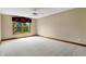 Charming bedroom with a large window and ceiling fan at 15482 Bridgewater Club Blvd, Carmel, IN 46033