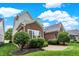 Brick house with a large backyard and patio at 15482 Bridgewater Club Blvd, Carmel, IN 46033