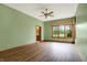 Relaxing bedroom with hardwood floors and access to en-suite bathroom at 15482 Bridgewater Club Blvd, Carmel, IN 46033