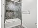 Bathroom with tiled shower/tub combo and modern fixtures at 1053 Westview Point Dr, Columbus, IN 47201