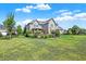 Large backyard with two-story home and deck at 2929 Post Oak Ct, Westfield, IN 46074