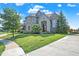 Brick house with a large yard and a circular driveway at 2929 Post Oak Ct, Westfield, IN 46074