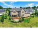 Two-story brick house with a large backyard, deck, and gazebo at 2929 Post Oak Ct, Westfield, IN 46074