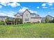 Large backyard with two-story brick home at 2929 Post Oak Ct, Westfield, IN 46074
