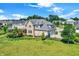Brick house with a three-car garage and a large backyard at 2929 Post Oak Ct, Westfield, IN 46074