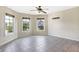 Spacious bedroom with tile flooring, ceiling fan, and multiple windows at 2929 Post Oak Ct, Westfield, IN 46074
