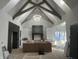 Kitchen under construction, features an island and vaulted ceiling with chandelier at 719 Wexford Hill Ct, Westfield, IN 46074