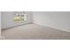Spacious bedroom with neutral carpeting and large window at 16910 Cattle Hollow Ln, Noblesville, IN 46060