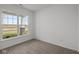 Well-lit bedroom with carpeted floor and a window at 16910 Cattle Hollow Ln, Noblesville, IN 46060