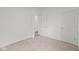 Bright bedroom featuring plush carpeting and access to hallway at 16910 Cattle Hollow Ln, Noblesville, IN 46060