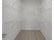 Large walk-in closet with wire shelving at 16910 Cattle Hollow Ln, Noblesville, IN 46060