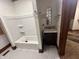 Clean bathroom with shower/tub combo and vanity at 202 N State St, Greenfield, IN 46140