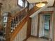 Grand staircase with ornate woodwork at 202 N State St, Greenfield, IN 46140