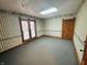 Bright bedroom with neutral walls and wood trim at 202 N State St, Greenfield, IN 46140